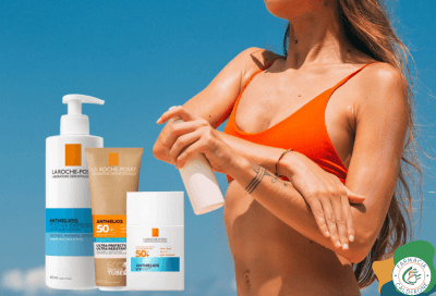 Ragazza in costume da bagno che tiene in mano una protezione solare, accanto a lei i solari La Roche Posay, simbolo di sicurezza e cura della pelle al sole.